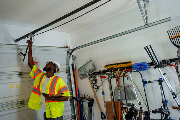 Professional Garage Door Panel Replacement technician working in Monticello, IL